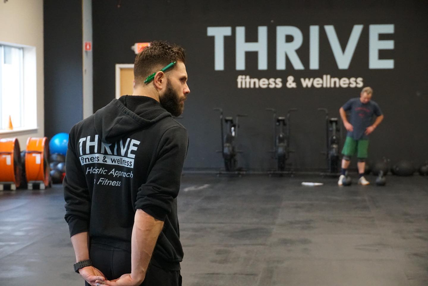 Profile shot of personal trainer in the Thrive Group Strength Training gym
