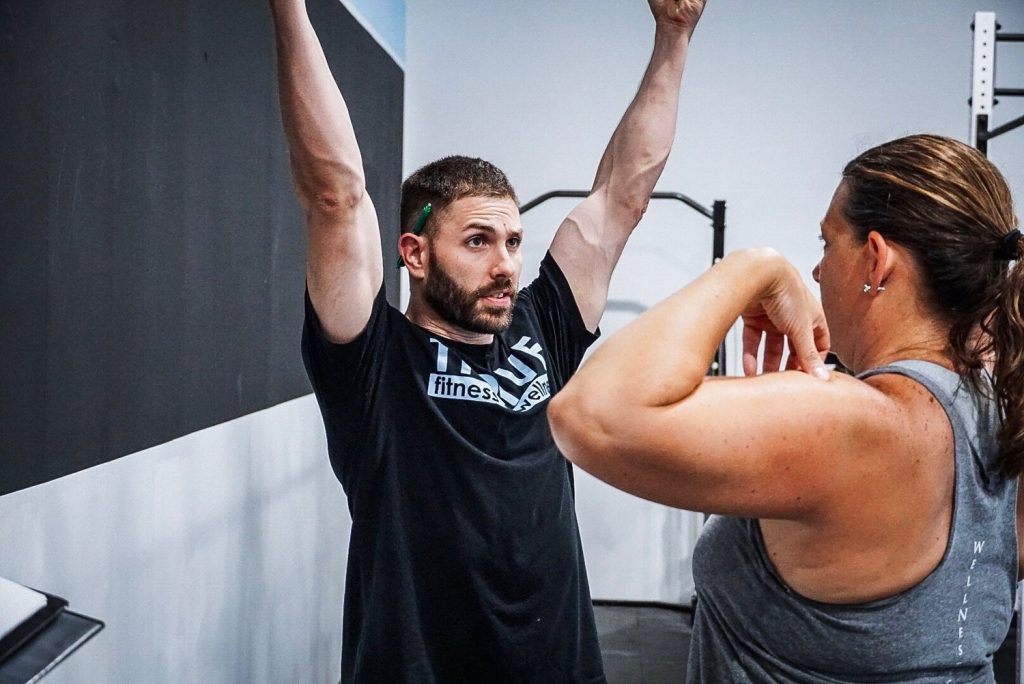 Personal trainer at Thrive Group Strength Training working one-on-one with client